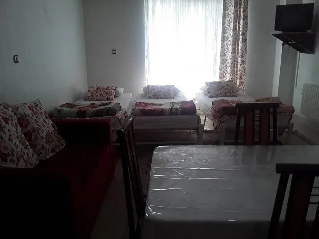 اتاق چهار تخته — هتل آپارتمان رادمهر تنکابن
